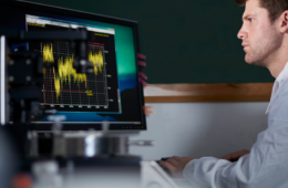 scientist analyzing data on computer screen