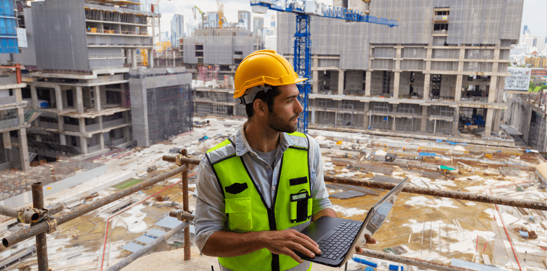 portrait of an engineer checking assets at construction site portrait of an engineer checking assets at construction site